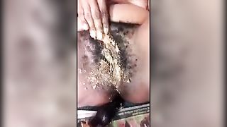 Black girl masturbating with yellow shit
