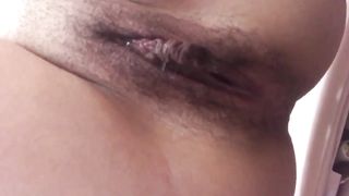 Close up of a girl pooping