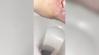 Shaved girl pooping slowly