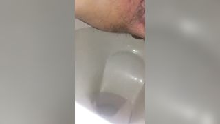 Shaved girl pooping slowly