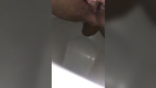Shaved girl pooping slowly