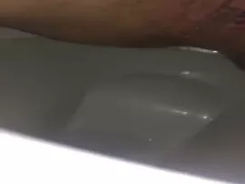 Shaved girl pooping slowly