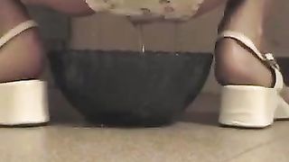 Brunette babe shitting in white panties