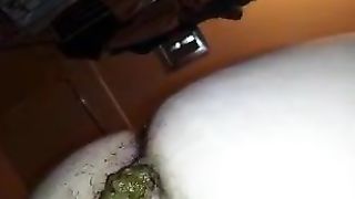 Hairy girl shitting a big one