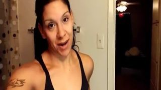 Tattooed babe using a homemade toilet