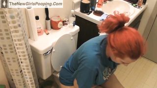 Redhead babe shitting two times