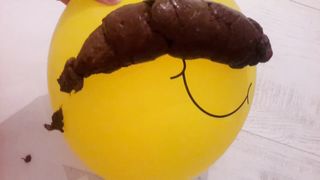 Big pile of shit on plastic balloon