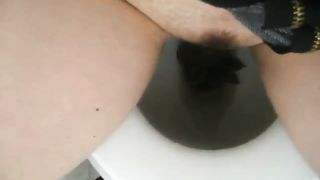 Girl shitting in the toilet