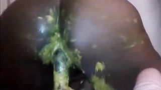 Hairy black girl smears yellow shit on her ass