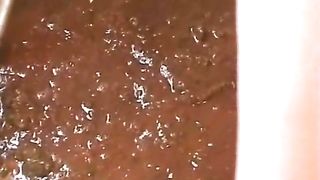 Two girls shitting after doing enema