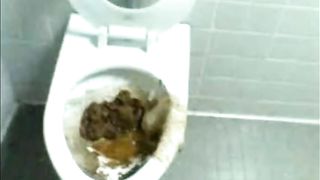 Shaved girl pooping a big one