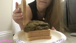 Beautiful girl prepares a scat sandwich