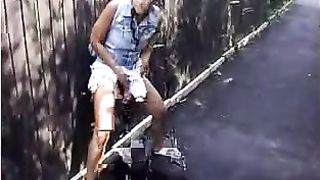 Petite girl peeing outdoor slowly for us